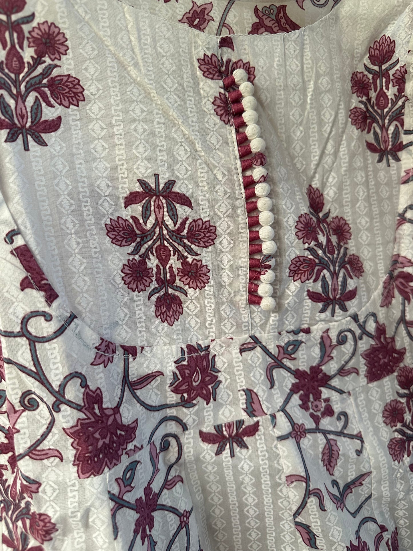 WHITE FLORAL PRINTED SLEEVELESS COTTON ANARKALI SUIT